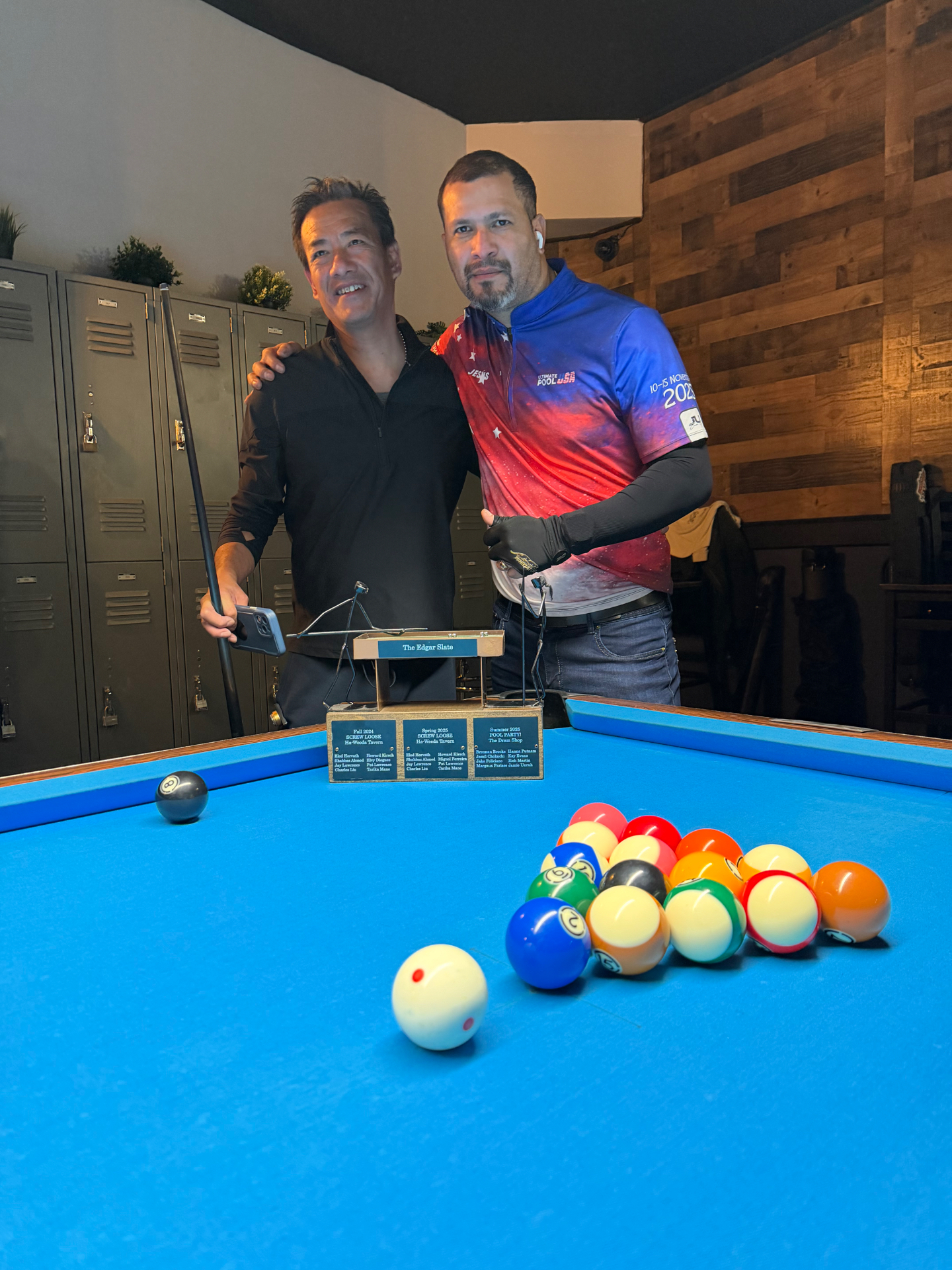 Jesús Hernández operating Queens Pro Pool League with players at the pool hall